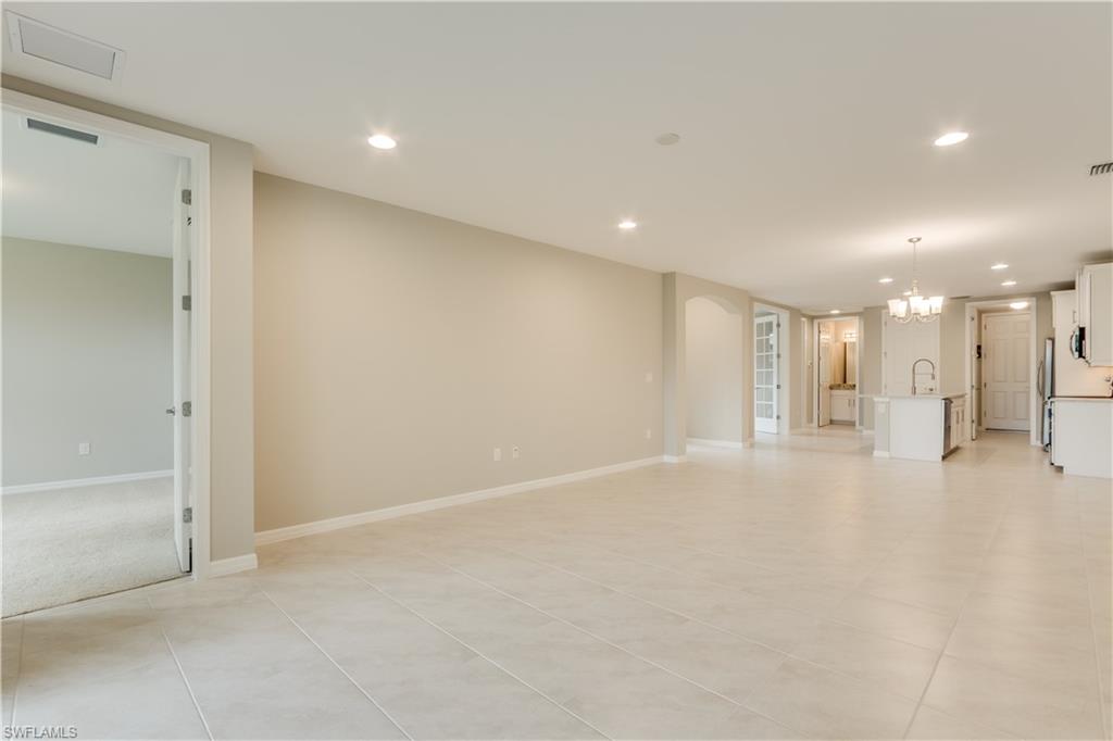 14863 Edgewater Circle Naples, FL 34114 - Photo 11 of 35 a view of an empty room