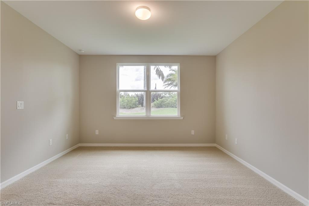 14863 Edgewater Circle Naples, FL 34114 - Photo 16 of 35 an empty room with a window