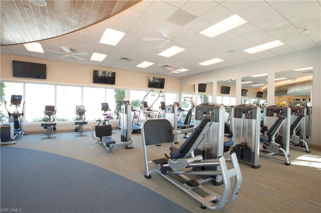 14863 Edgewater Circle Naples, FL 34114 - Photo 33 of 35 a view of a room with gym equipment