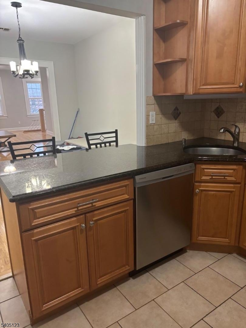 917 Madison Avenue Elizabeth, NJ 07201 - Photo 4 of 13 a kitchen with a sink and cabinets