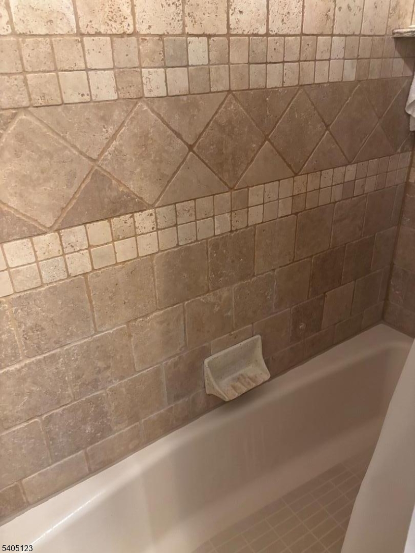 917 Madison Avenue Elizabeth, NJ 07201 - Photo 5 of 13 a bathroom with a shower