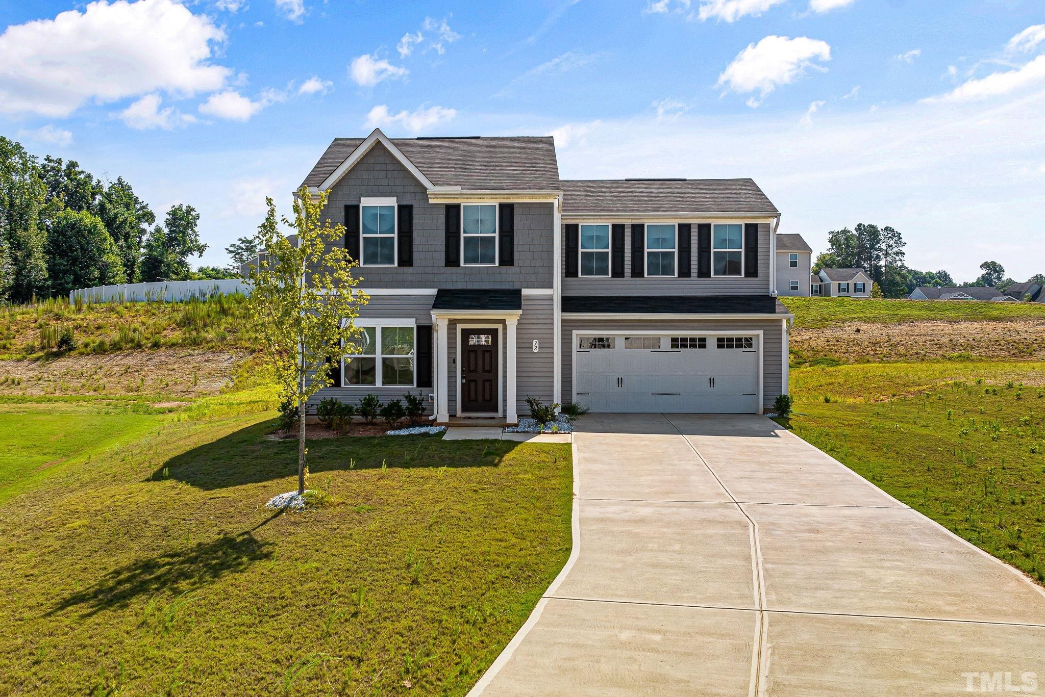 a view of a house with swimming pool