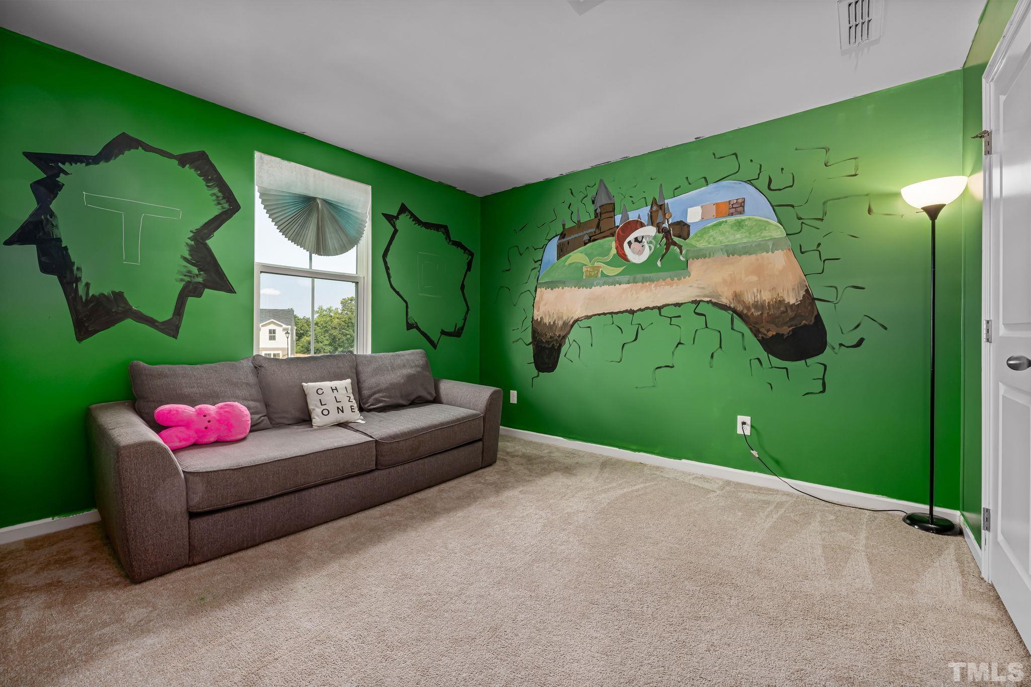 32 Powder Court Angier, NC 27501 - Photo 12 of 14 a living room with furniture and a fireplace