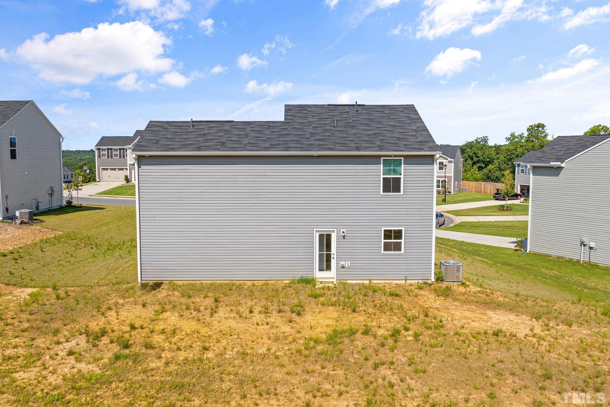 32 Powder Court Angier, NC 27501 - Photo 14 of 14 a view of a house with backyard