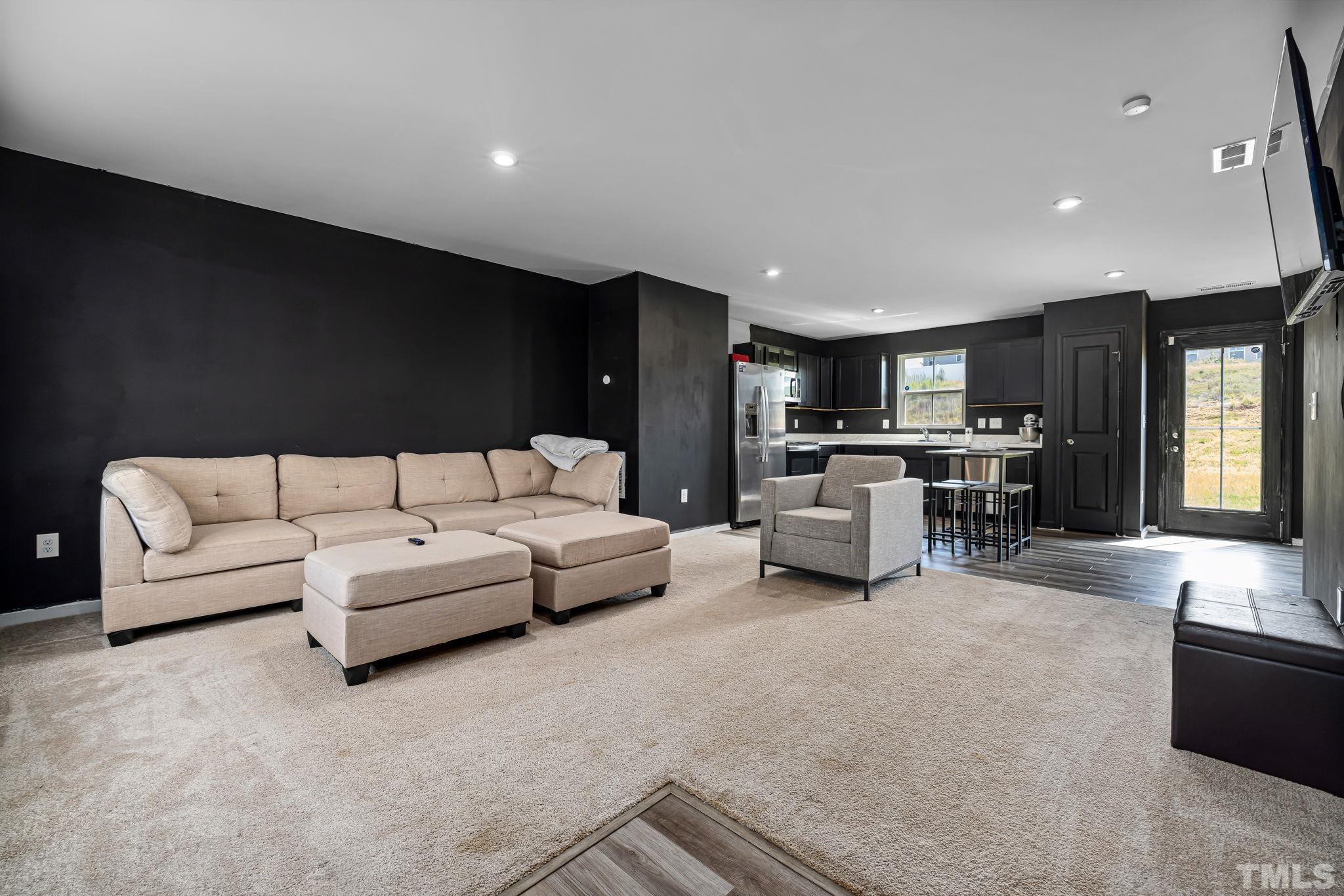 32 Powder Court Angier, NC 27501 - Photo 2 of 14 a living room with furniture and a couch