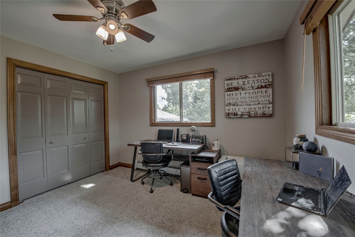 74 Big Elk Road Dillon, CO 80435 - Photo 15 of 37 a workspace with wooden floor and windows