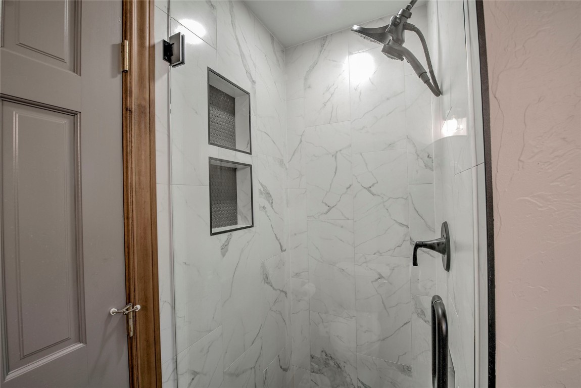 74 Big Elk Road Dillon, CO 80435 - Photo 25 of 37 a bathroom with a shower and a mirror