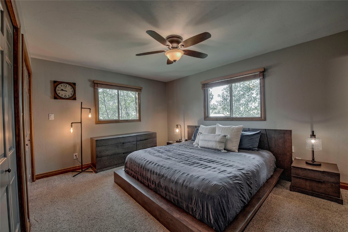 74 Big Elk Road Dillon, CO 80435 - Photo 8 of 37 a bedroom with a bed and window