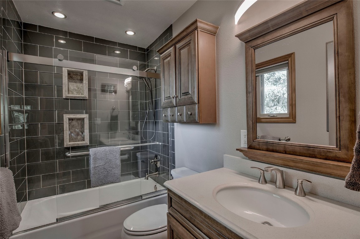 74 Big Elk Road Dillon, CO 80435 - Photo 10 of 37 a bathroom with a shower sink and mirror