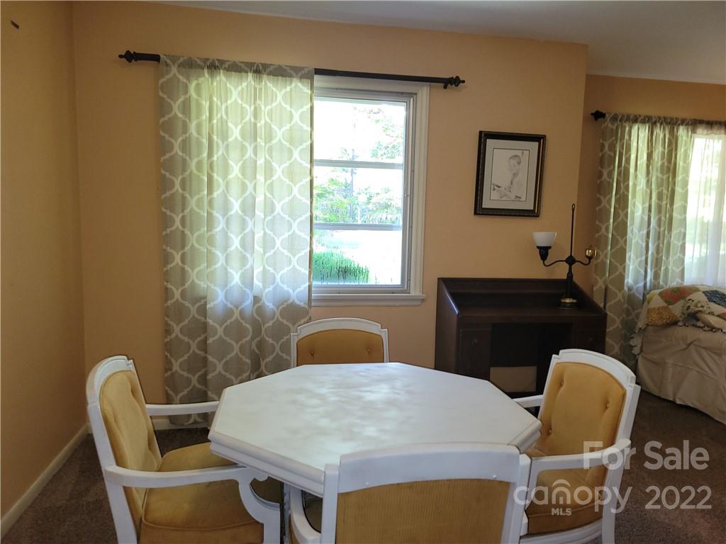 536 Biscoe Road Troy, NC 27371 - Photo 11 of 18 a dining room with furniture and window
