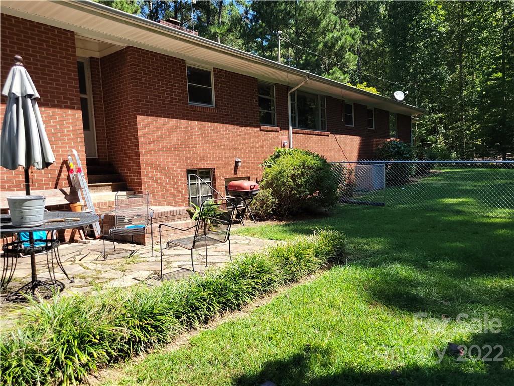 536 Biscoe Road Troy, NC 27371 - Photo 3 of 18 a view of backyard of house with green space
