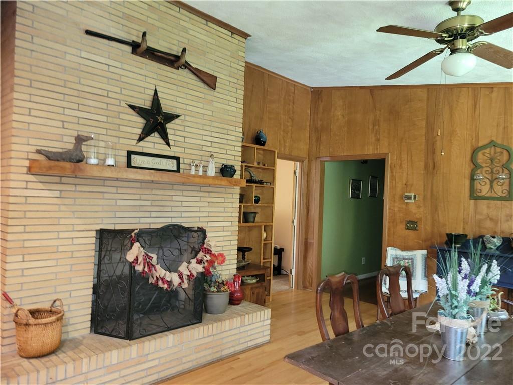 536 Biscoe Road Troy, NC 27371 - Photo 8 of 18 a view of a livingroom with furniture and a fireplace