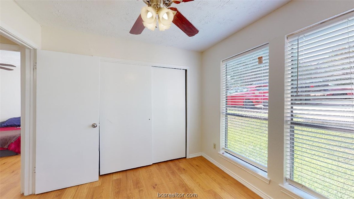 1005 Spring Loop, Unit C College Station, TX 77840 - Photo 12 of 25 a view of an empty room with a window