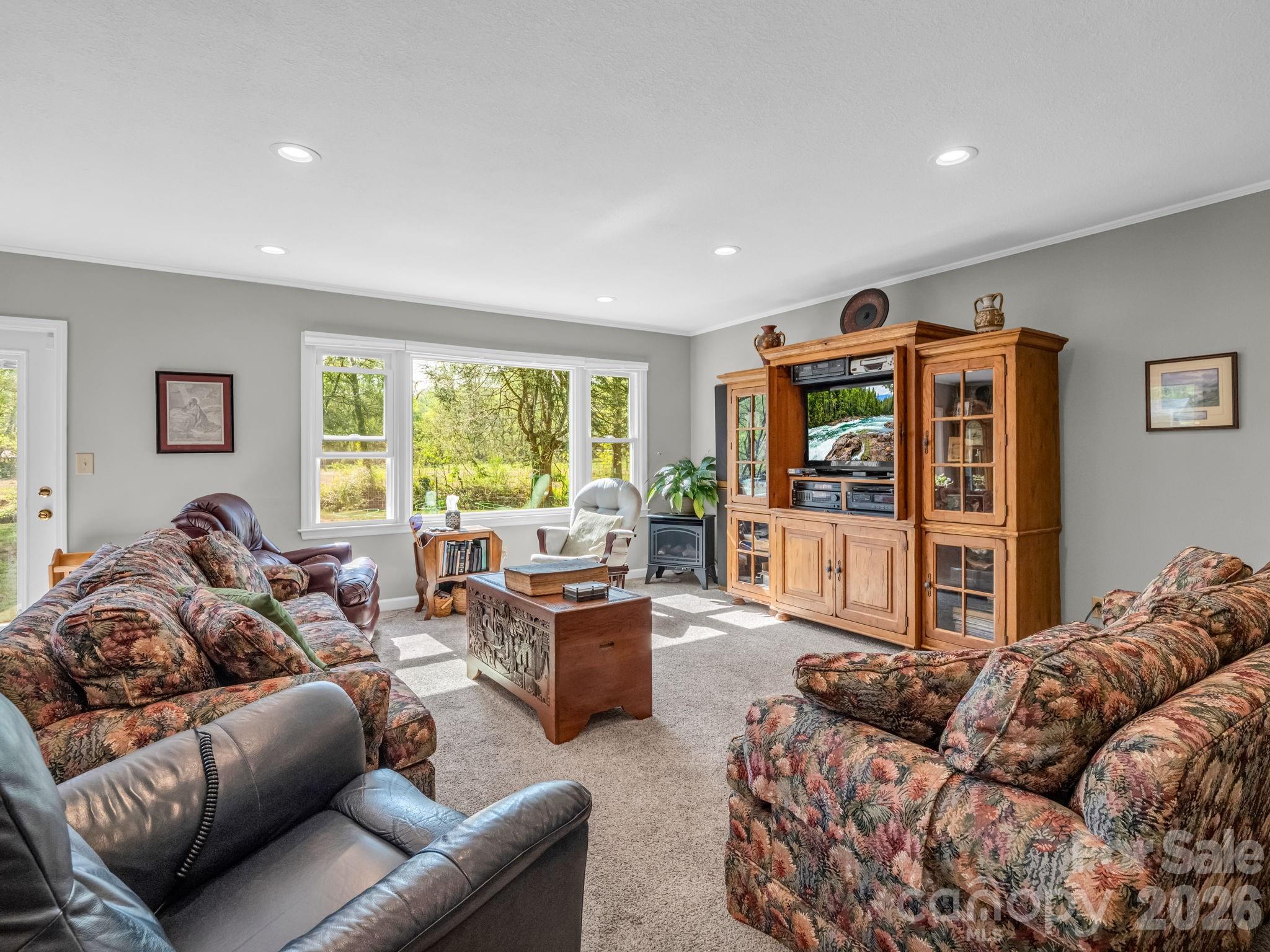 120 Warrior Drive Tryon, NC 28782 - Photo 12 of 44 a living room with furniture and a large window