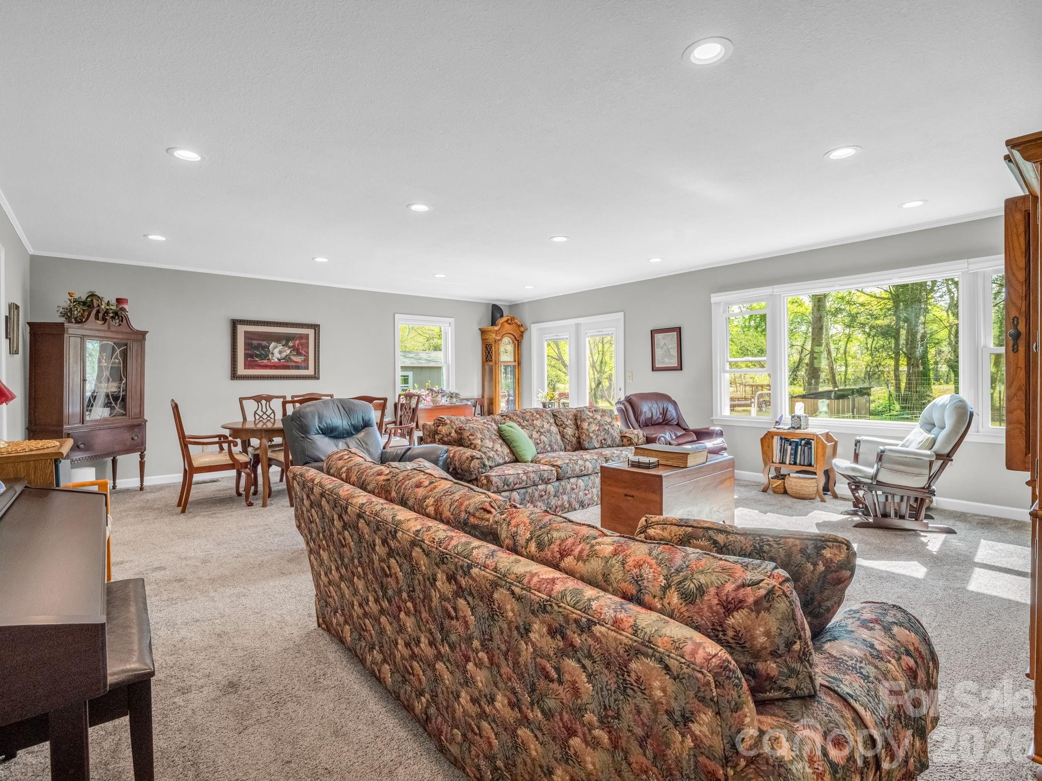 120 Warrior Drive Tryon, NC 28782 - Photo 13 of 44 a living room with furniture and a large window