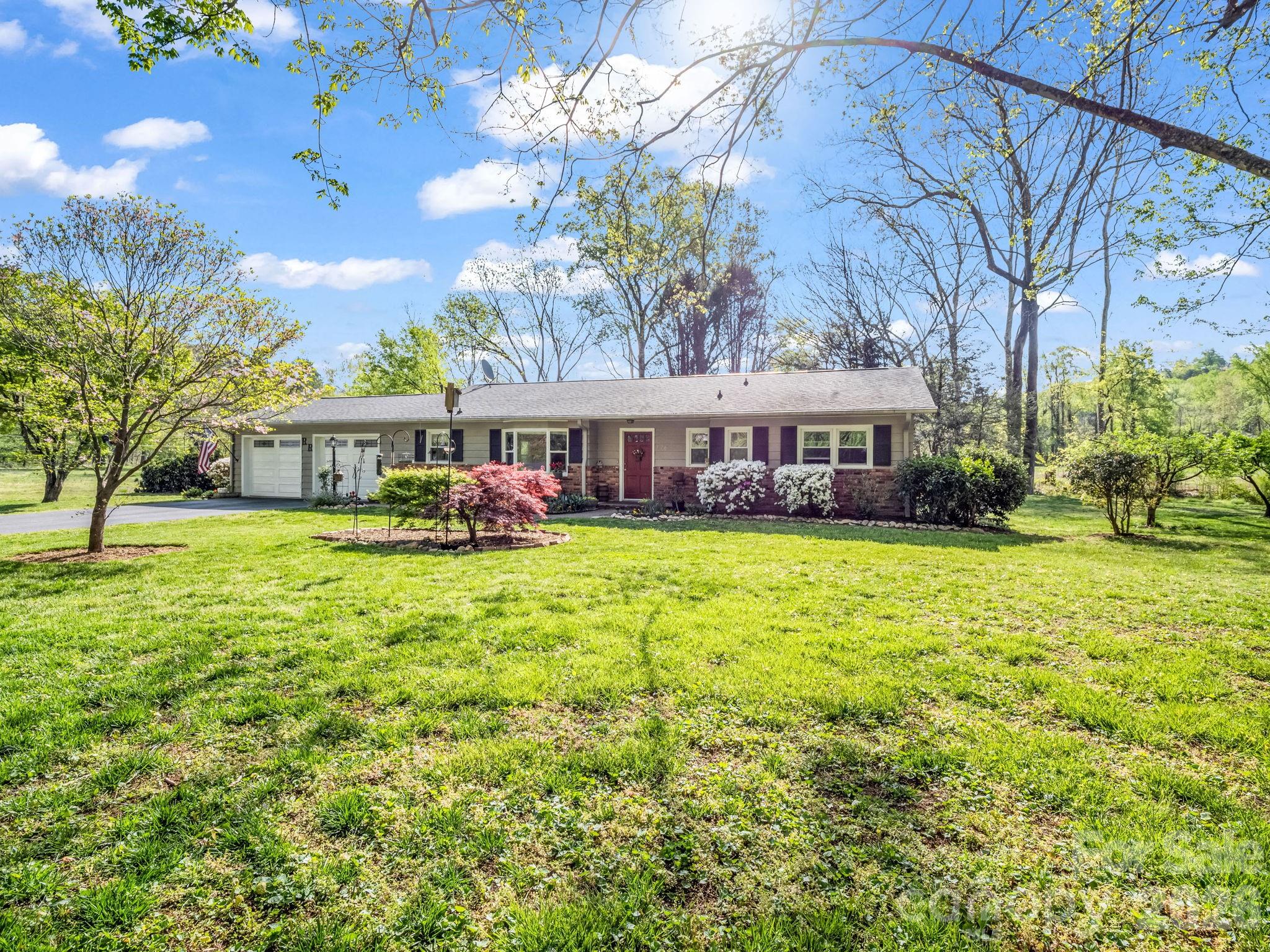 120 Warrior Drive Tryon, NC 28782 - Photo 2 of 44 a view of a house with a big yard
