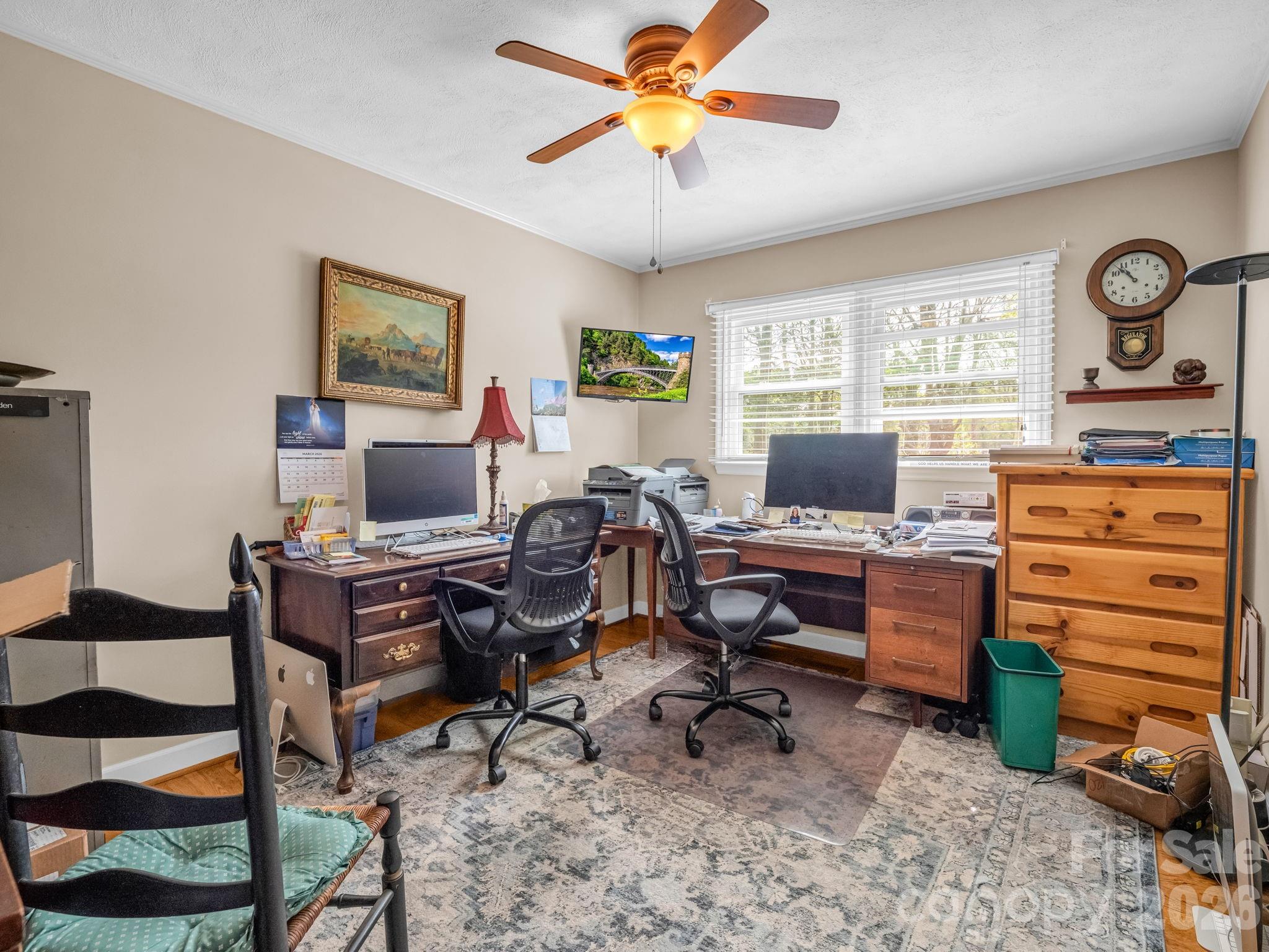 120 Warrior Drive Tryon, NC 28782 - Photo 23 of 44 a view of a workspace with furniture and a window