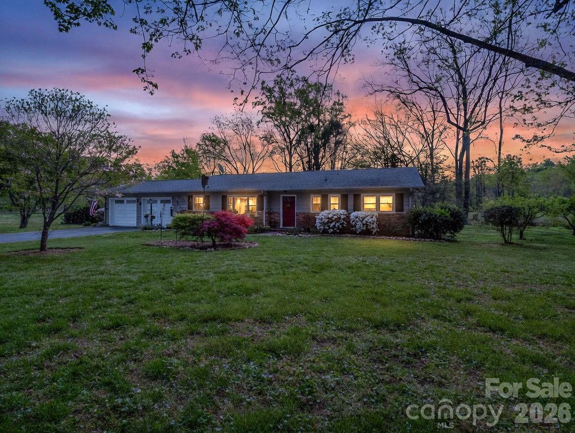 120 Warrior Drive Tryon, NC 28782 - Photo 40 of 44 a view of a house with a yard