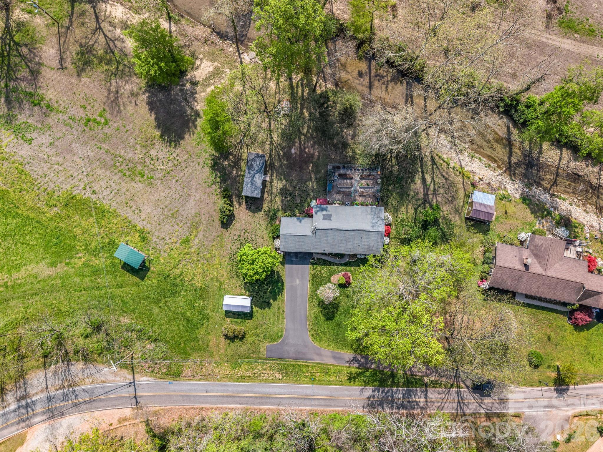 120 Warrior Drive Tryon, NC 28782 - Photo 42 of 44 an aerial view of a house with a yard