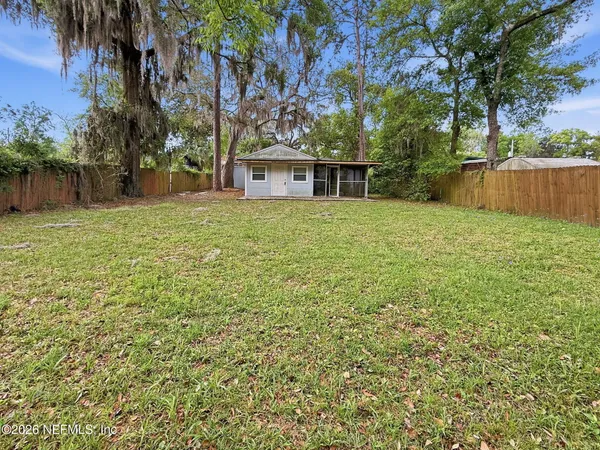 a house with trees in front of it