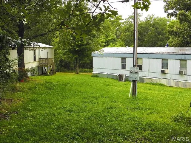 $115,000 | 100-102 Vernon Street, Unit 100 102 103 105, St. Robert, MO 65584