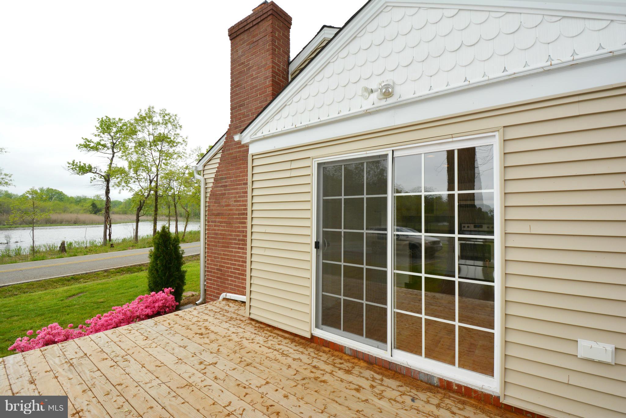 1507 Terrell Road Shady Side, MD 20764 - Photo 3 of 29 Deck with Waterview of Flag Pond