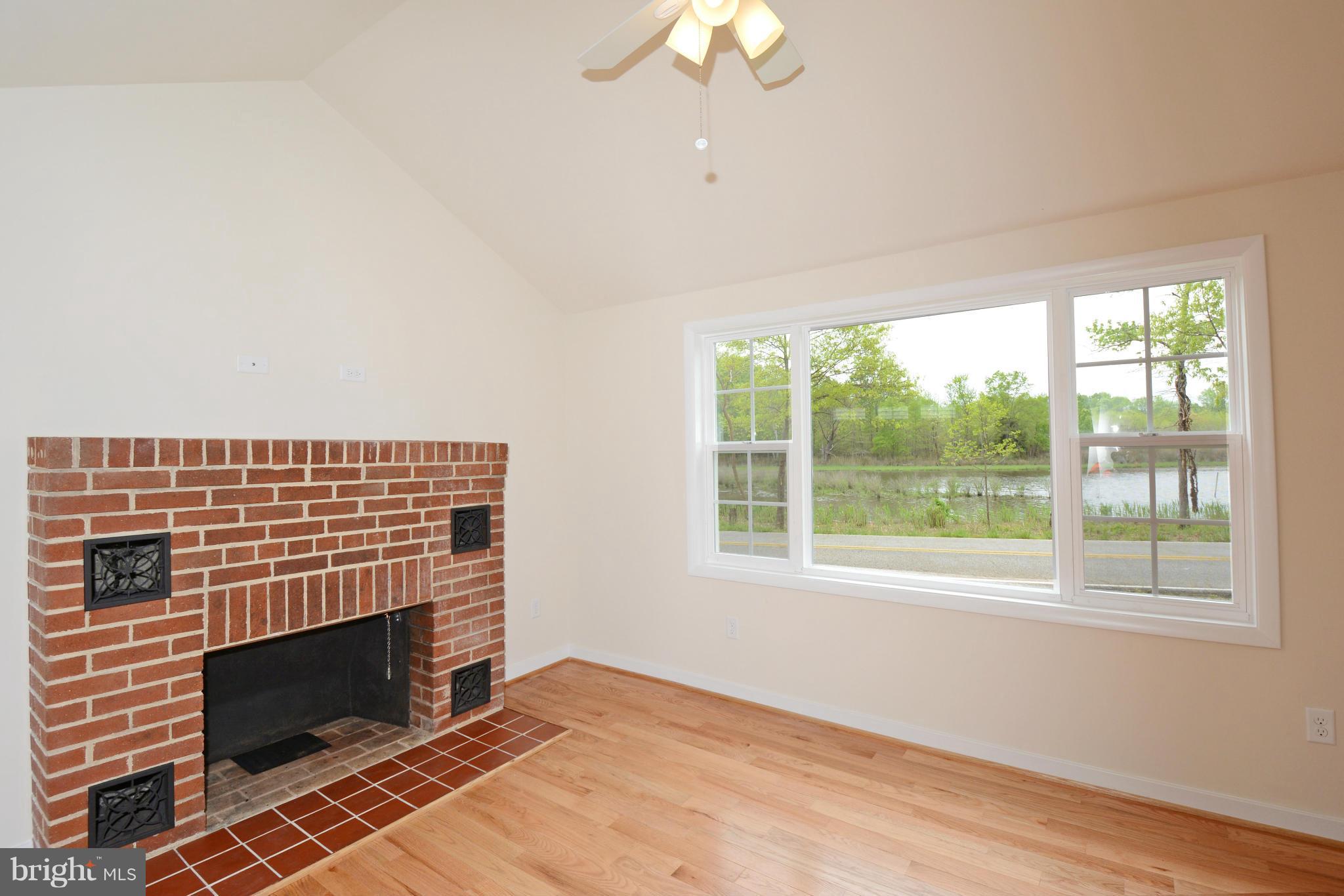 1507 Terrell Road Shady Side, MD 20764 - Photo 9 of 29 Living Room has wood burning Fireplace