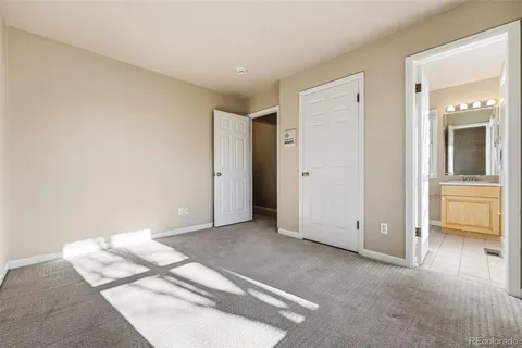 a view of a room with a walk in closet