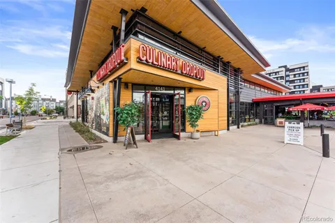 a view of a building with sitting area