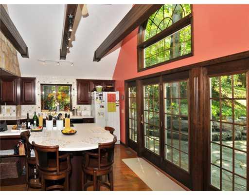 80 Dietrich Road Fox Chapel, PA 15238 - Photo 6 of 15 Kitchen. Large Vaulted Ceiling with Skylight and French Doors Leading Out to Stone Patio
