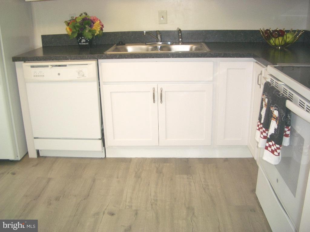 15107 Interlachen Drive, Unit 2811 Silver Spring, MD 20906 - Photo 16 of 31 Nice flooring in the kitchen