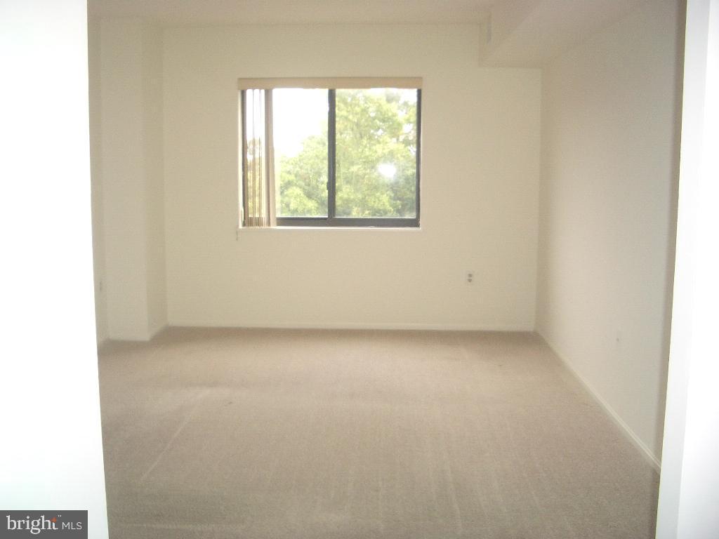15107 Interlachen Drive, Unit 2811 Silver Spring, MD 20906 - Photo 17 of 31 Primary bedroom