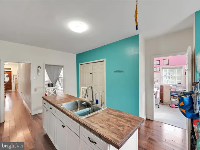 a kitchen with sink and window