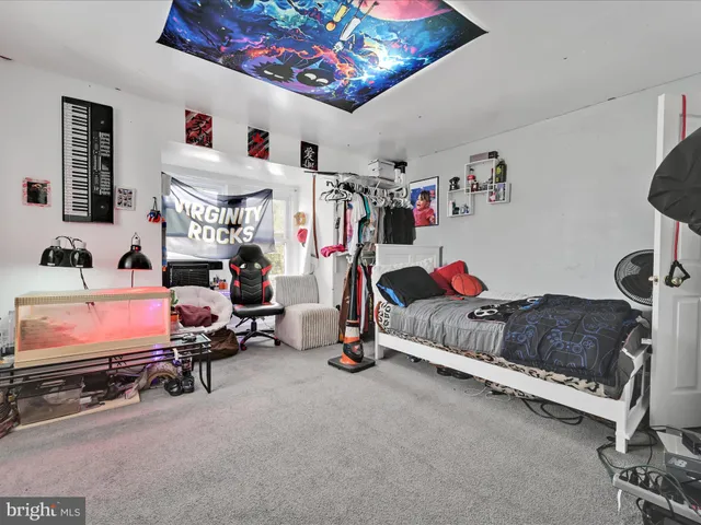 a bedroom with furniture