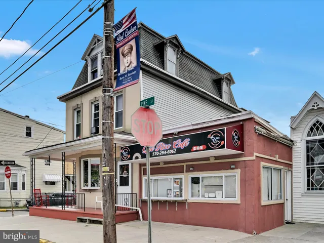 a view of a building with a street