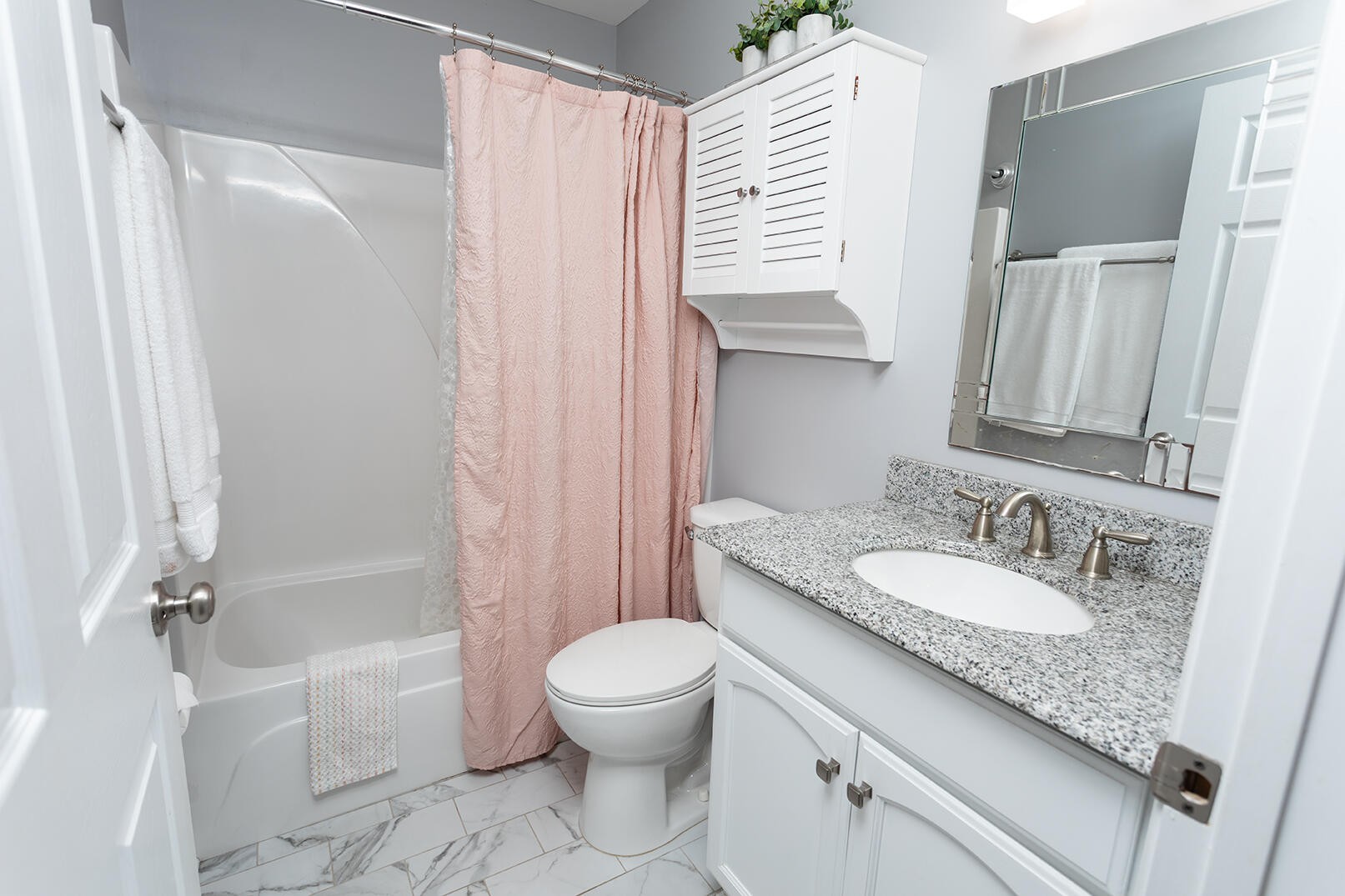 8903 Bay View Drive Chattanooga, TN 37416 - Photo 15 of 25 a bathroom with a granite countertop sink toilet and shower