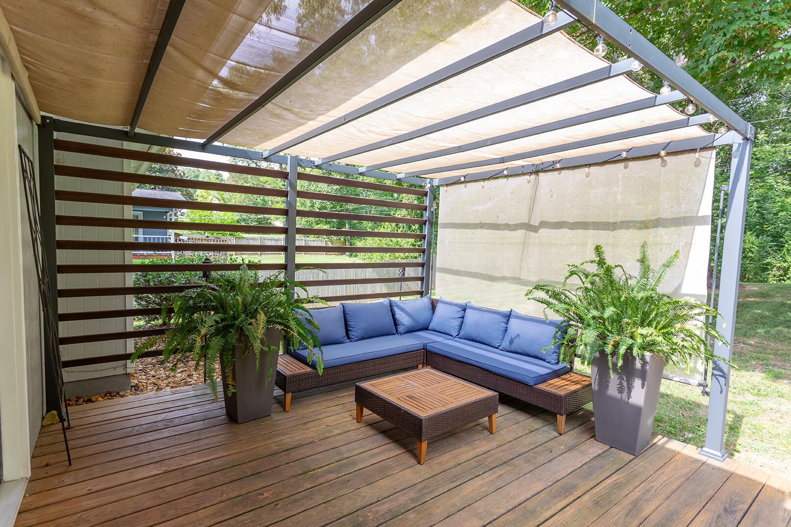 8903 Bay View Drive Chattanooga, TN 37416 - Photo 22 of 25 a living room with furniture and a potted plant