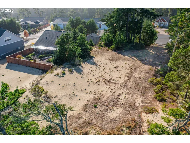 a view of a backyard of the house