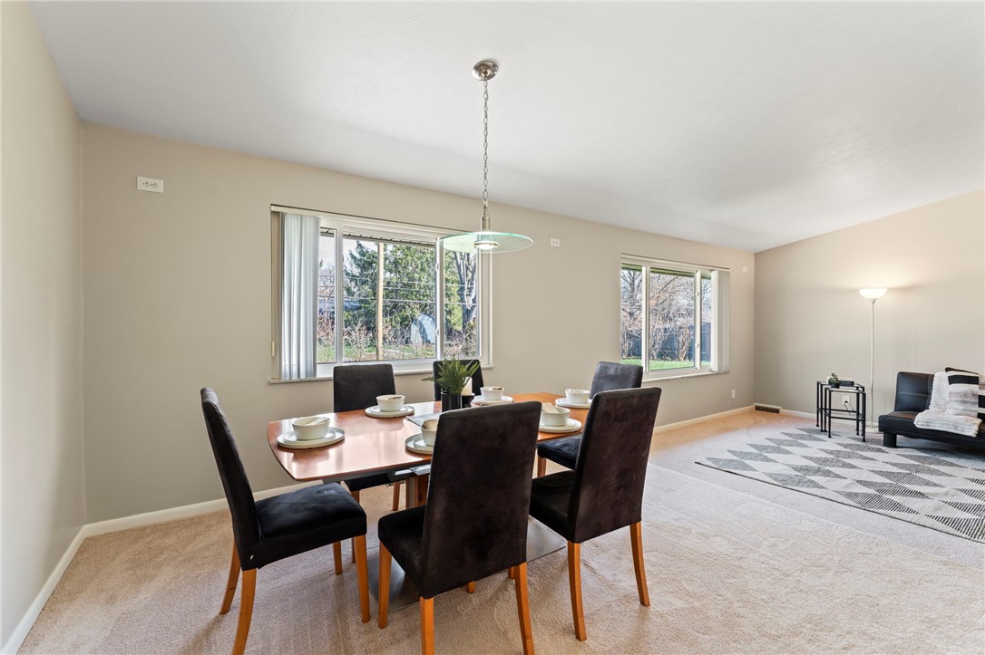 2247 East Whipp Road Dayton, OH 45440 - Photo 15 of 52 This bright dining area features ample natural light and seamless access to the living space.