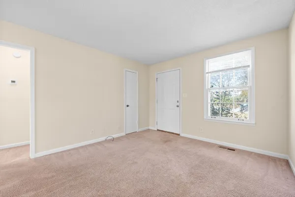 an empty room with windows