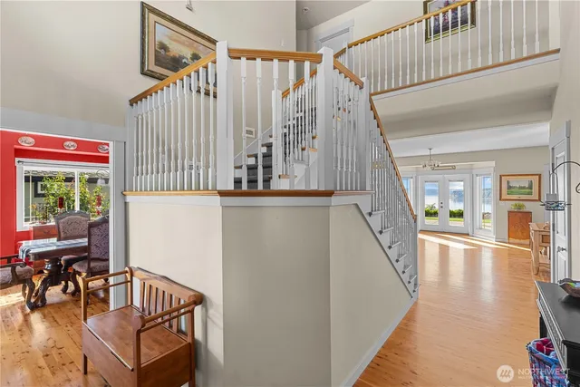 a view of a hallway with seating space