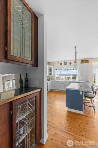 a kitchen with stainless steel appliances granite countertop a stove and a refrigerator