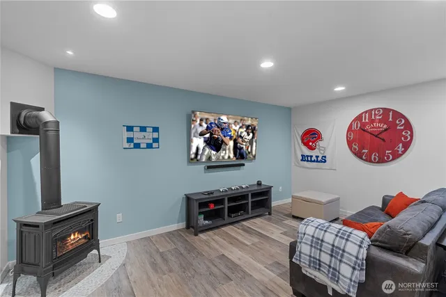 a view of a livingroom with furniture and a flat screen tv