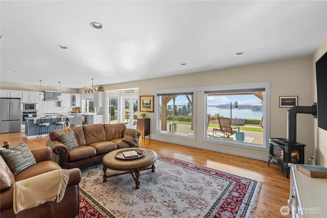 a living room with furniture and a rug