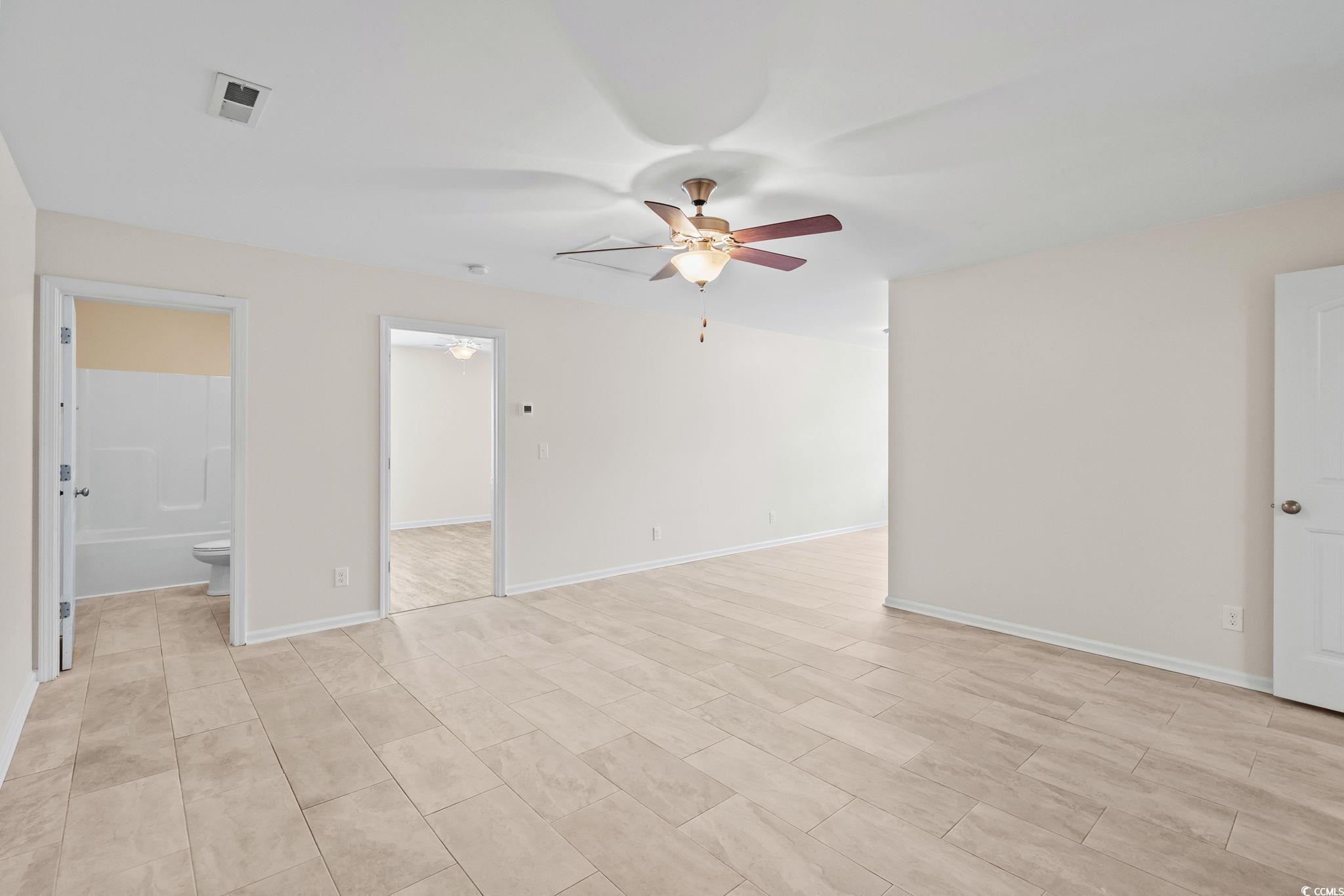 1050 Kennington Court Conway, SC 29526 - Photo 19 of 40 Unfurnished room featuring a ceiling fan and baseboards