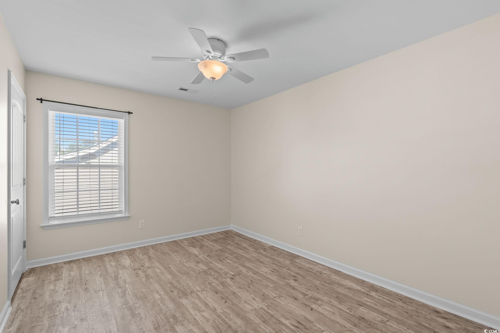 1050 Kennington Court Conway, SC 29526 - Photo 20 of 40 Unfurnished room featuring light wood finished floors and ceiling fan