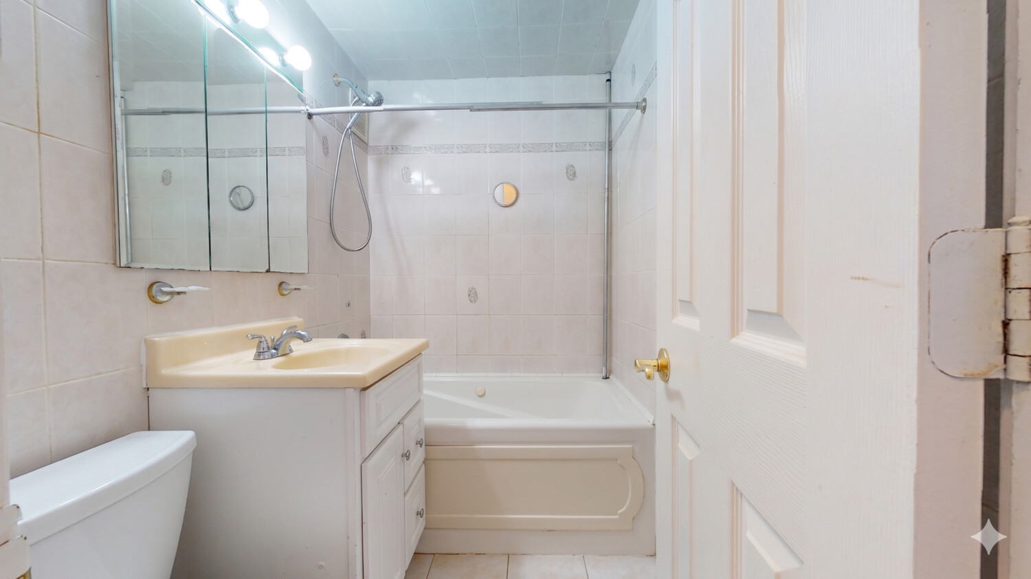 1200 Gravesend Neck Road, Unit 3L Brooklyn, NY 11229 - Photo 10 of 10 a bathroom with a sink toilet and shower