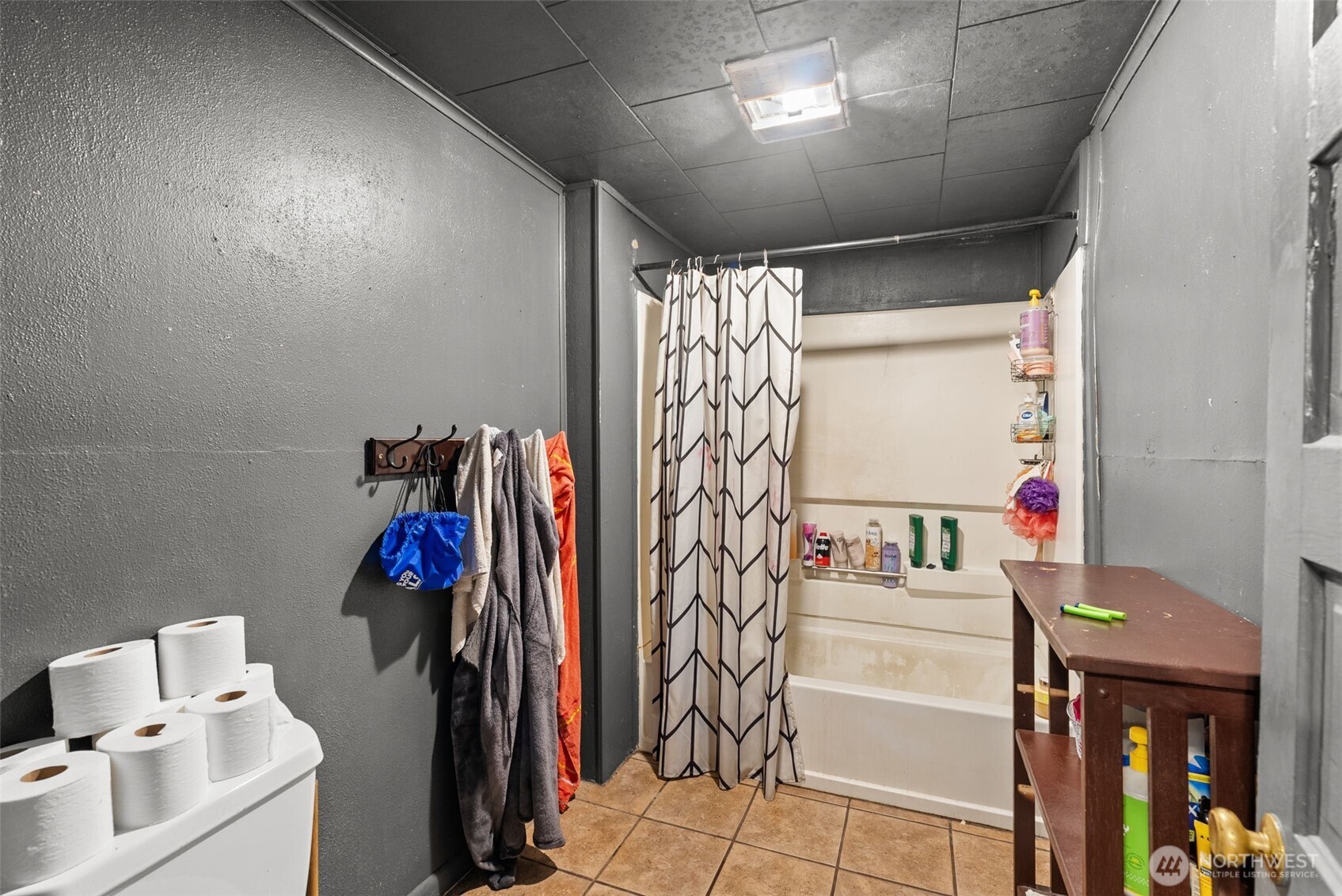 1024 H Street Centralia, WA 98531 - Photo 13 of 16 a view of walk in closet with clothes and shoes