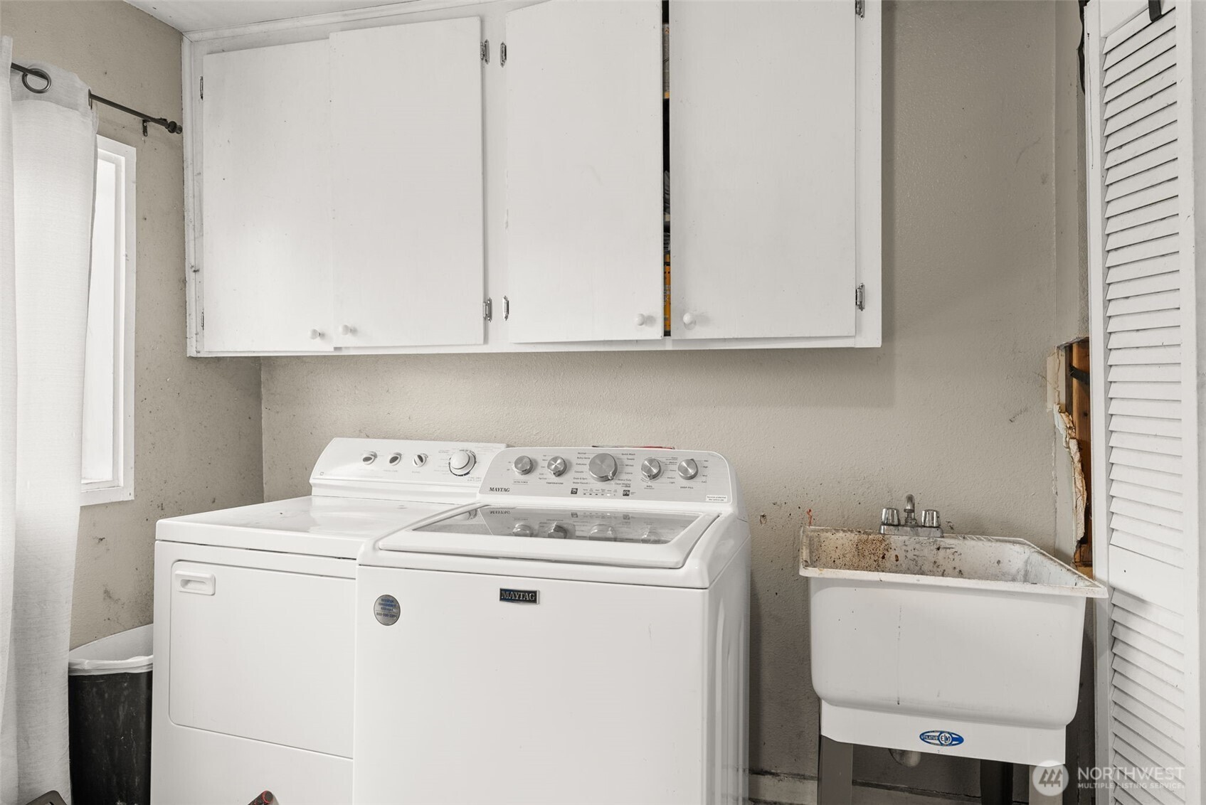 1024 H Street Centralia, WA 98531 - Photo 16 of 16 a utility room with dryer and washer
