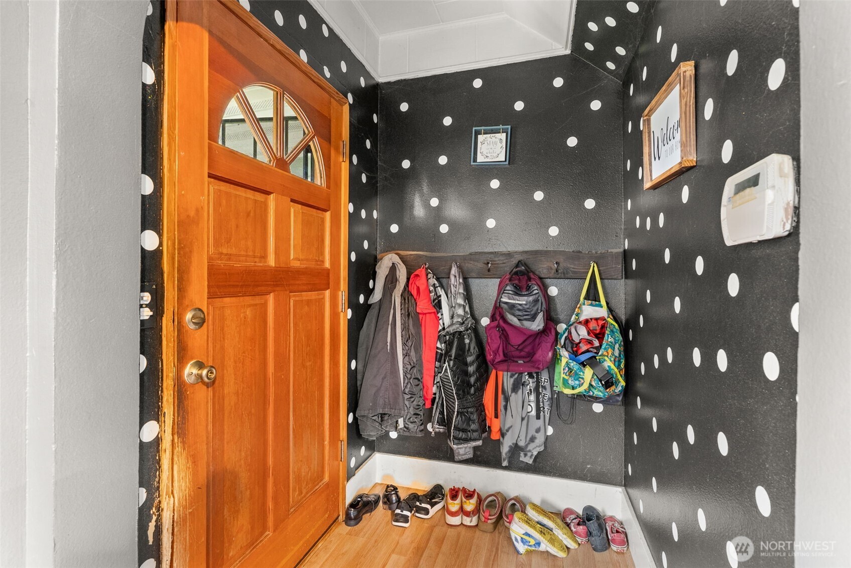 1024 H Street Centralia, WA 98531 - Photo 5 of 16 a view of walk in closet with clothes and shoes